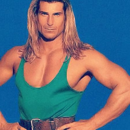 Fabio Lanzoni is giving pose for the photo.